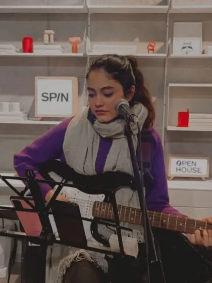 Performing a solo set for an in-store event. My solo acoustic performance is versatile and can fit into any space or occasion.