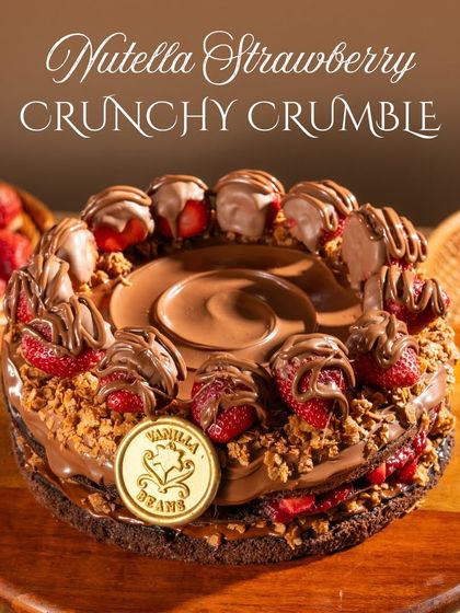 The full view of our Nutella Strawberry Crunchy Crumble cake. We sprinkle our signature house-made crumble from top to bottom for a satisfying crunch in every bite.