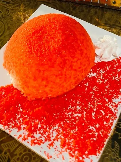 The vibrant color and texture of the Oozing Jelly Pastry make it a standout dessert.
