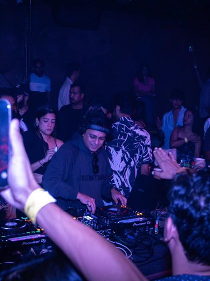A fan capturing the moment on their phone at Magique, Bangalore. I love the close connection I can build in venues like this.