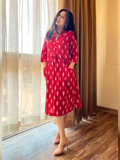 Elegance in every thread. The red Ikat dress-cum-kurta is your perfect companion for any occasion, being timeless, versatile, and effortlessly chic.
