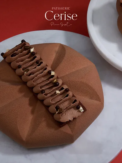 The geometric, origami-like texture of this version of the Mochaccino entremet shows how I love to play with form.