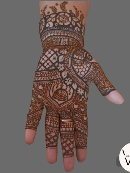 Another intricate Indian design with a mix of patterns.