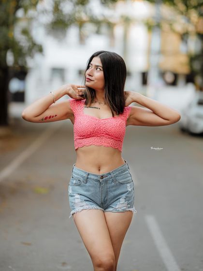 This image captures a spontaneous, happy moment during an outdoor shoot. I aim to capture genuine expressions that make the photos feel authentic and relatable.