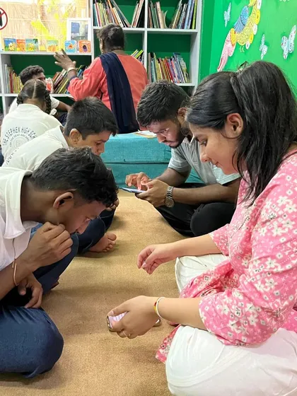 Research assistants work with children in small groups, using tablets and games to make the assessment process engaging. This data is vital for ensuring our programs are truly transformative.
