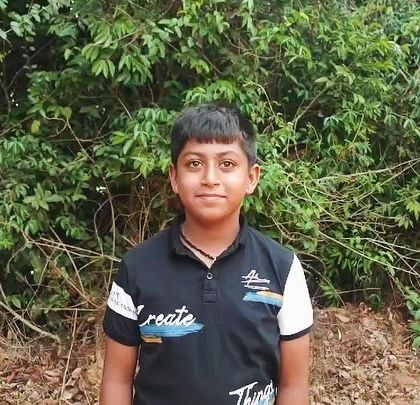 A smiling camper shares his thoughts after a fulfilling day at our Barapole camp.