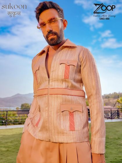 Class never shouts, it simply arrives. This belted safari-style co-ord set from the Sukoon collection offers a look of effortless elegance for any stylish escape.