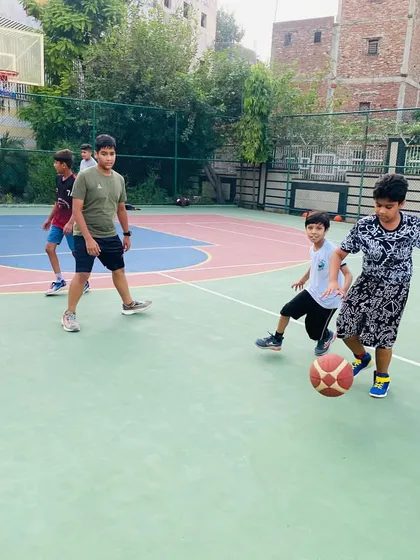 A young player learns to handle the ball under pressure.