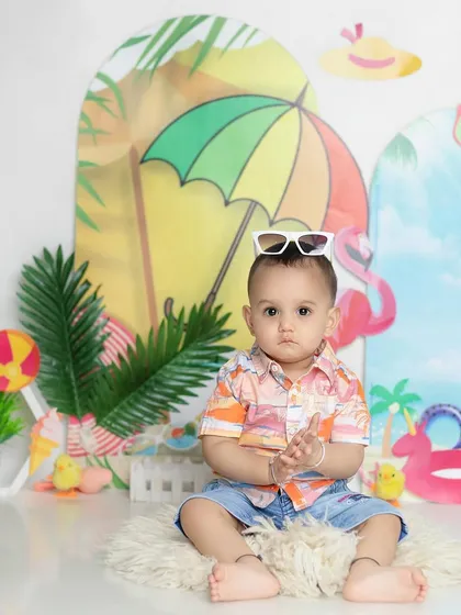 A more serious, model-like pose from our little beachgoer. I capture a range of expressions to give you lots of variety.