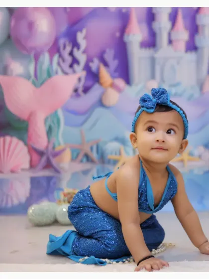 Dive into a world of imagination with our magical mermaid photoshoot. We use enchanting underwater-themed backdrops and detailed costumes to create a truly unique portrait for your child.