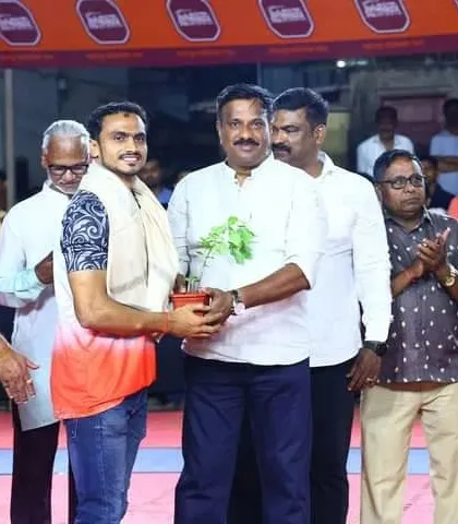 Honoring one of our players for his performance during the friendship match.