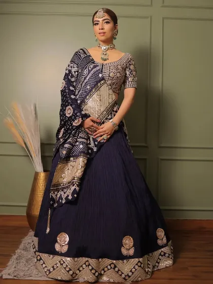 A full-length view of the Faabiiana bandhani lehenga, showing how the traditional textile is given a modern silhouette.