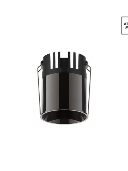The Liquid Beam downlight in a plated gunmetal black finish. This choice creates a complete anti-glare effect, as the dark reflector absorbs stray light, resulting in a very comfortable and dramatic illumination.
