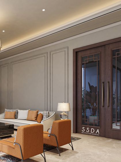 The grand double doors with geometric detailing provide a stately entrance to the formal living room, hinting at the blend of classic and modern design that lies within.