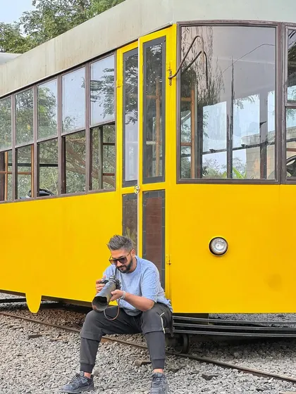 Checking the settings on my camera before the shoot begins.