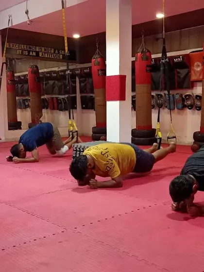 Our Friday conditioning sessions are all about pushing our limits with exercises like TRX planks to build a rock-solid core.