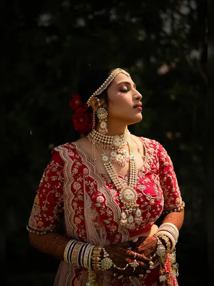 A sun-kissed shot of the bride, her skin glowing and her makeup looking absolutely radiant in the natural light.