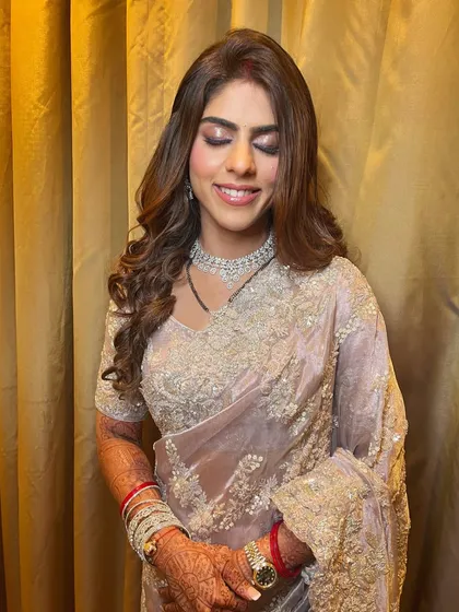 The smile of a happy bride, confident and beautiful in her reception glam.