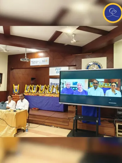 A hybrid satsang in session, with devotees joining both in person and online to listen to a conversation with Nayaswami Jyotish and Devi. Technology helps us connect our spiritual family across distances.