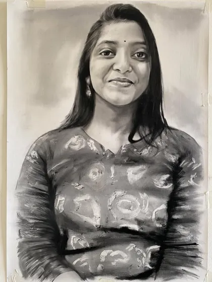 A dry brush portrait capturing a woman's warm and friendly smile.