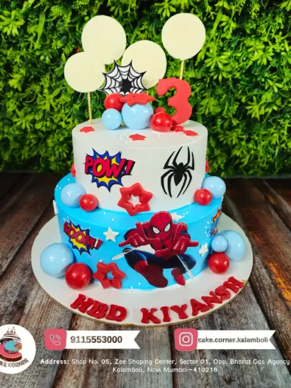 Swing into the party with this two-tier Spiderman cake. With comic book "POW!" signs and Spidey in action, it's a design that any Spiderman fan will love for their birthday.
