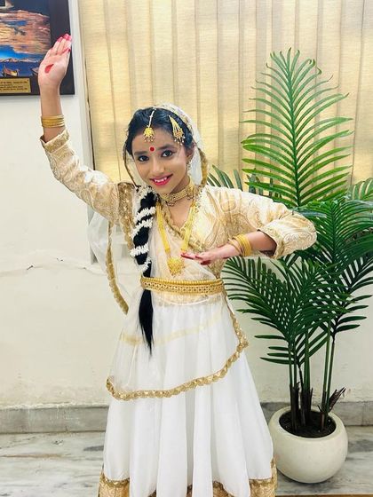 This student is ready for her classical dance performance. We train students in various dance forms, from folk to classical, for competitions and school events.