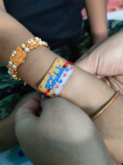 Our hand-painted 'Bahubali' Rakhi standing out among the traditional threads of love. Happy Rakhi to all.