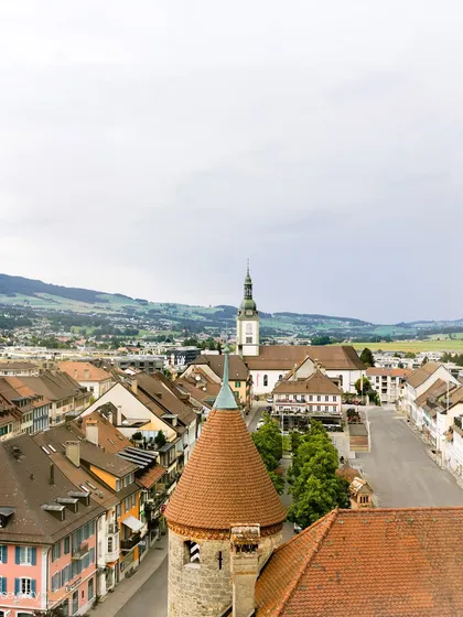 An establishing shot of the beautiful Swiss town where their story unfolded. The location is more than a backdrop; it's a part of the memory.