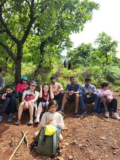 Our group taking a rest under a tree during the Kodachadri trek. We ensure a comfortable pace for everyone.