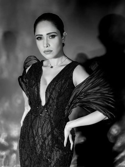 Another strong portrait from the series, this one with a slightly different pose that conveys a sense of poised elegance.