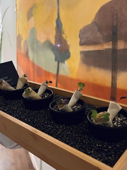 Mushroom Galouti Cornets being served on a tray. This signature appetizer is a vegetarian delight, full of umami flavor.