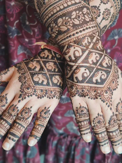 It’s all in the details. I had so much fun incorporating these adorable baby elephant motifs into this bridal design, a special request from the bride.