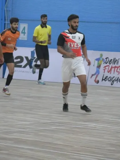 My players on the futsal court, demonstrating teamwork and movement in a confined space.