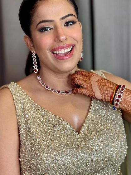 Priyanka looking absolutely joyful. This candid shot captures the happiness and the beautiful, natural-looking makeup.