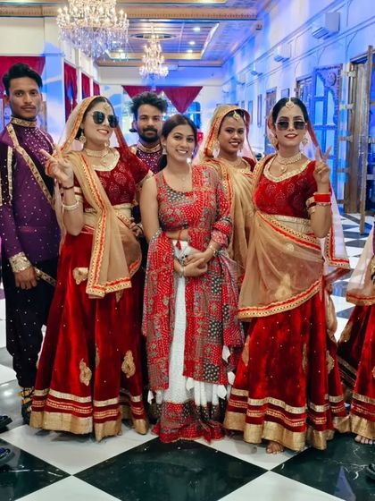 Here we are, Team Ashirvaad, with our talented dancers in their traditional costumes, ready for another grand performance.