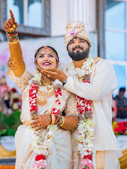 A joyful moment from my wedding. The complete look, from the mathapatti to the saree, came together to create a memorable bridal style.
