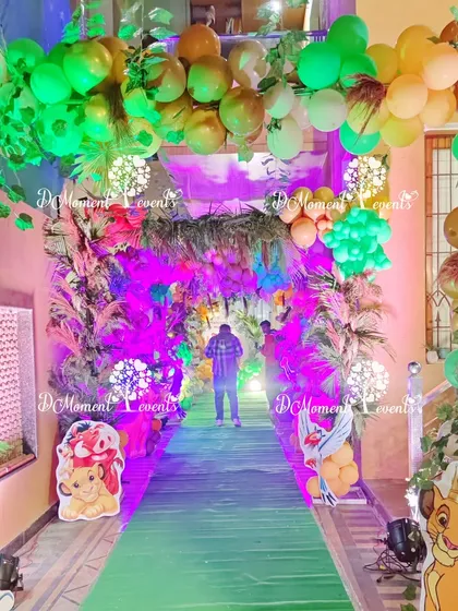 A final look at the immersive jungle entrance tunnel, showing the combination of balloons, foliage, and lighting that creates a magical effect.