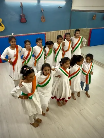 A group of young patriots posing after their Independence Day dance rehearsal. Their enthusiasm is truly inspiring.