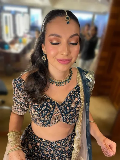 A perfect example of soft glam for a wedding event. This look features luminous skin, warm neutral tones on the eyes, and a natural glow that enhances your features without feeling heavy.
