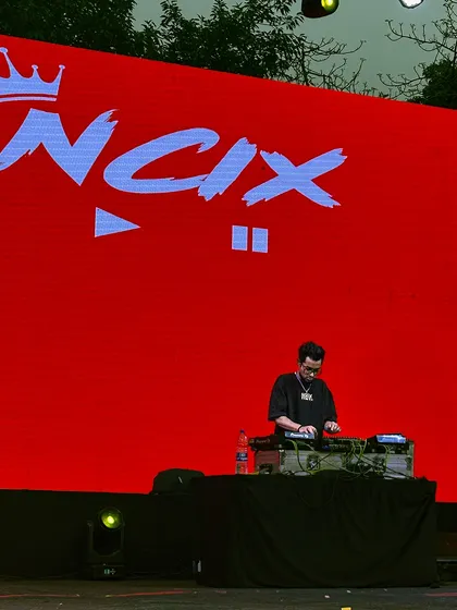 My name in lights on the big screen at Ramjas College, Delhi University. I provide custom visuals and branding for my sets to create a professional and immersive concert experience.