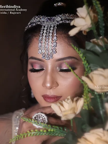 This romantic pose with soft lighting highlights the glowing skin and soft-glam makeup, ideal for pre-wedding functions.