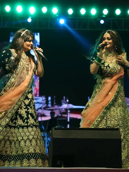 Performing in stunning traditional lehengas. We believe that our outfits are an important part of the visual storytelling of our music.