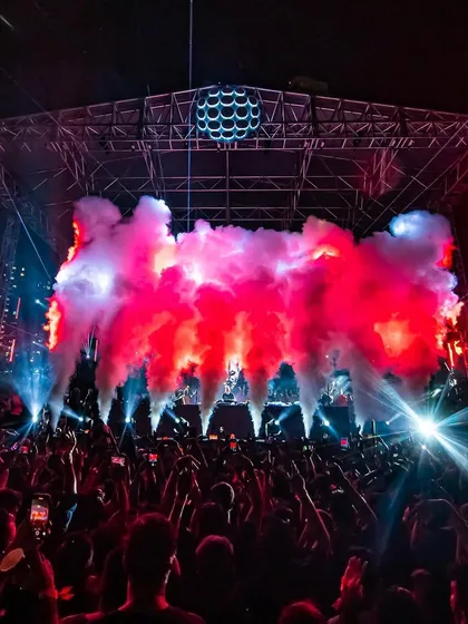 Red smoke fills the stage during Boris Brejcha's set, adding to the intense and dramatic atmosphere of his performance.