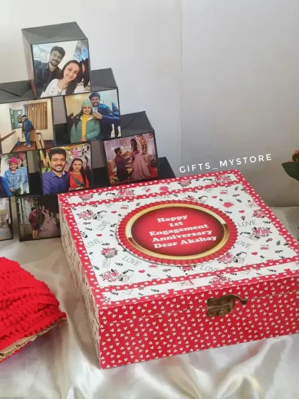 The complete set: a personalized keepsake box with the pop-up cubes and pyramid album. This one was for a first engagement anniversary.