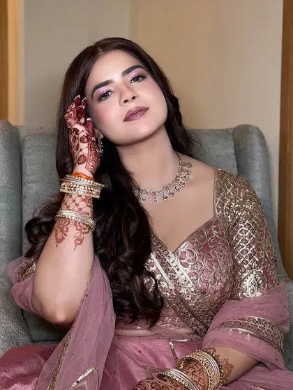 My 'Rokafied' bride Navya, looking absolutely lovely. The soft pink eyeshadow and matching lip colour create a harmonious and gentle look.
