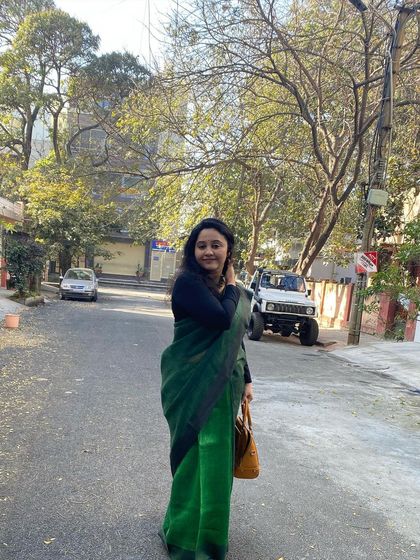 The right outfit can make you feel ready for anything. This professional saree look is comfortable for a walk around the city while still looking put-together and stylish.