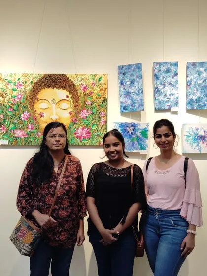 With visitors in front of my 'Lotus Buddha' and abstract paintings.