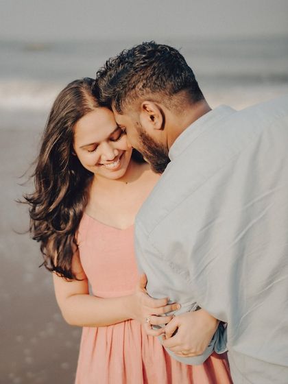 Another angle of Anushka and Manu's embrace, showing their comfortable and affectionate bond. The focus is entirely on their connection.