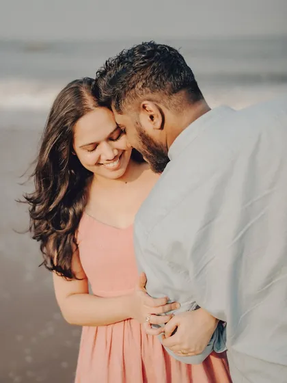 Another angle of Anushka and Manu's embrace, showing their comfortable and affectionate bond. The focus is entirely on their connection.