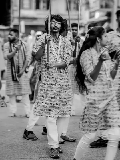 The black and white version of the photographer as a flag bearer.
